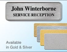 75x25mm gilt/chrome badge 2 lines of text